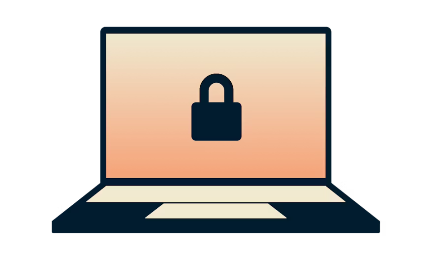 Laptop z kł&oacute;dką na pomarańczowym tle.